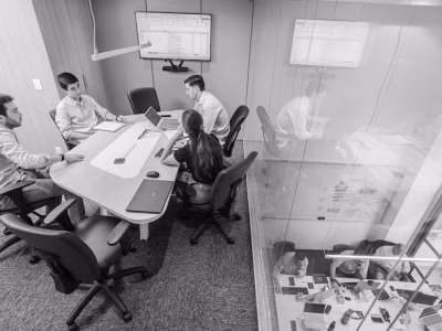 Local SEO team meeting analyzing local search data and business performance strategies